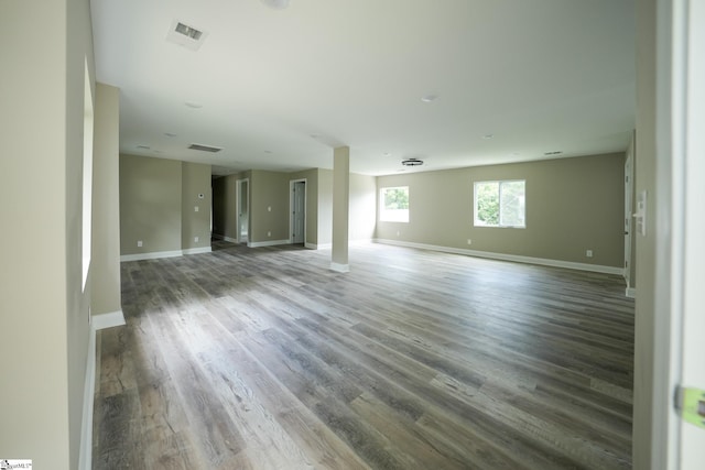 empty room with wood-type flooring