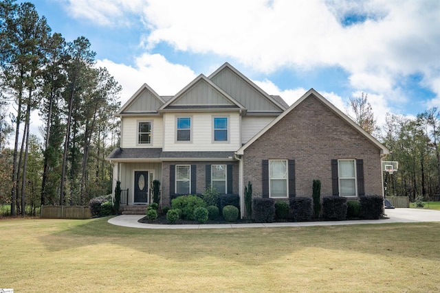 craftsman-style home with a front lawn