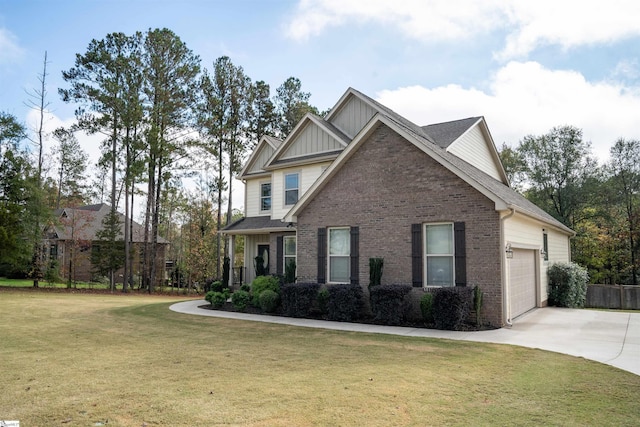 craftsman-style home featuring a front lawn and a garage