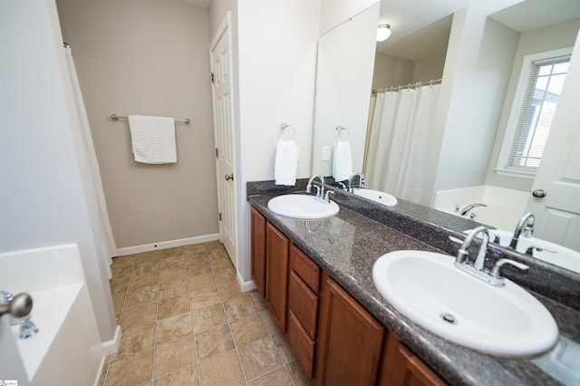 bathroom with vanity and a tub to relax in