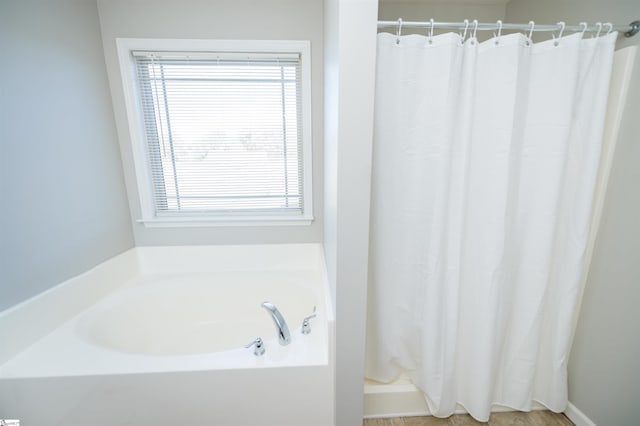 bathroom with independent shower and bath