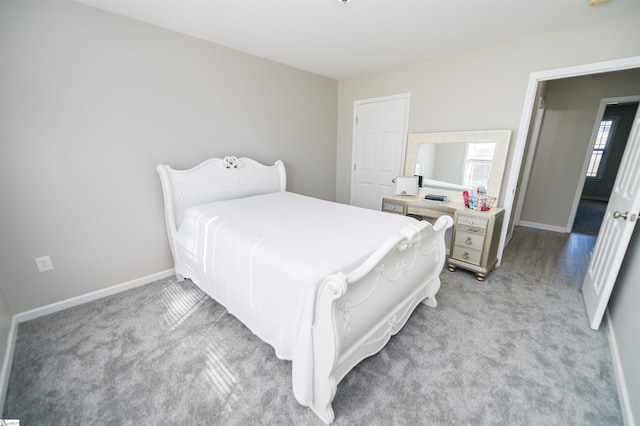 bedroom with light colored carpet