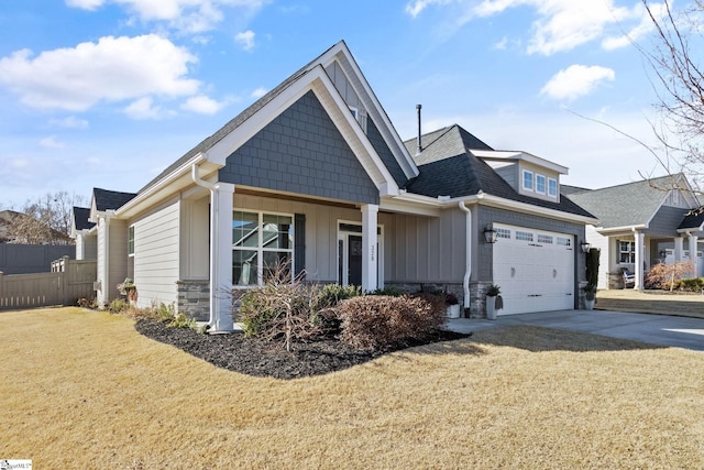 view of front of home with covered porch and a front yard