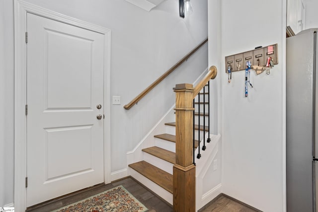 interior space with dark hardwood / wood-style floors