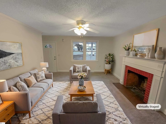 living room with ceiling fan, carpet floors, a textured ceiling, and a brick fireplace