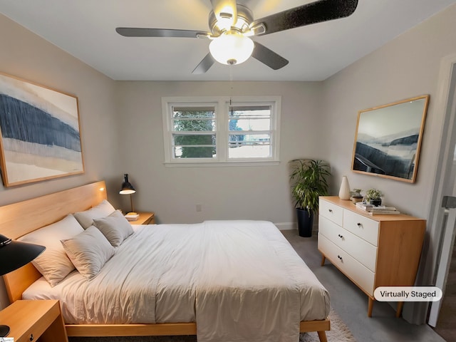 carpeted bedroom featuring ceiling fan