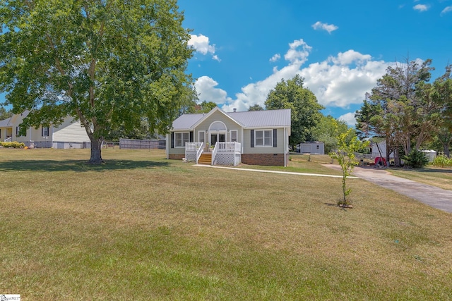 view of front of property with covered porch and a front yard