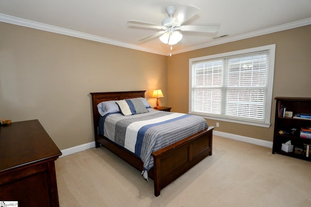 bedroom featuring ceiling fan, crown molding, and light carpet