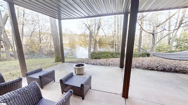 view of patio featuring a water view