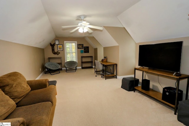 living room with ceiling fan, light colored carpet, and vaulted ceiling