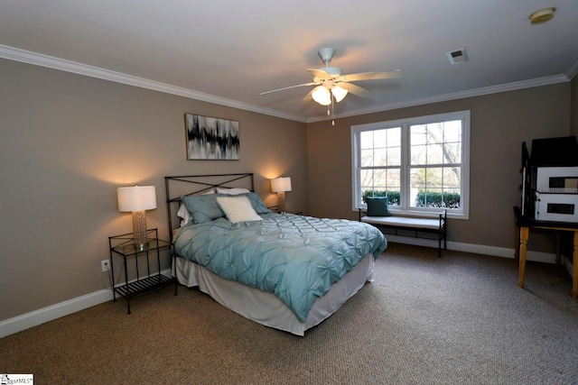 bedroom featuring ceiling fan, carpet floors, and ornamental molding