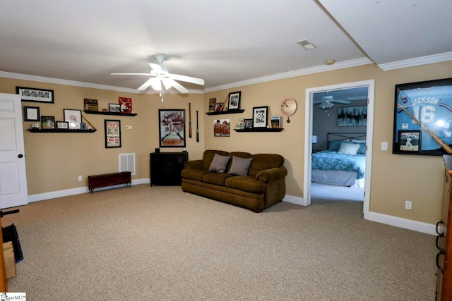 living room with light colored carpet, ceiling fan, and crown molding