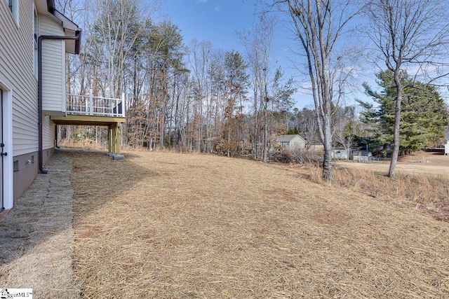 view of yard featuring a deck