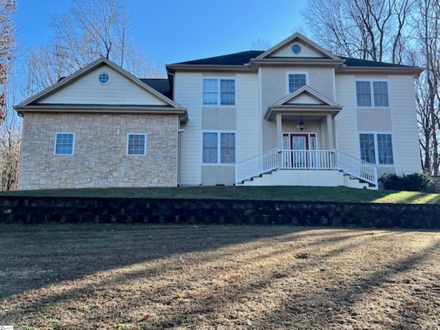 front of property featuring a front yard