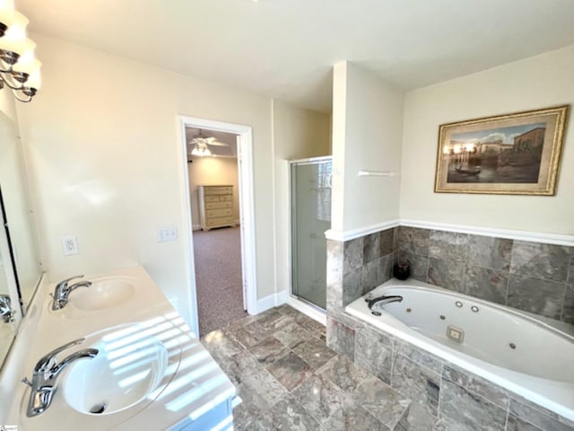 bathroom with vanity and independent shower and bath