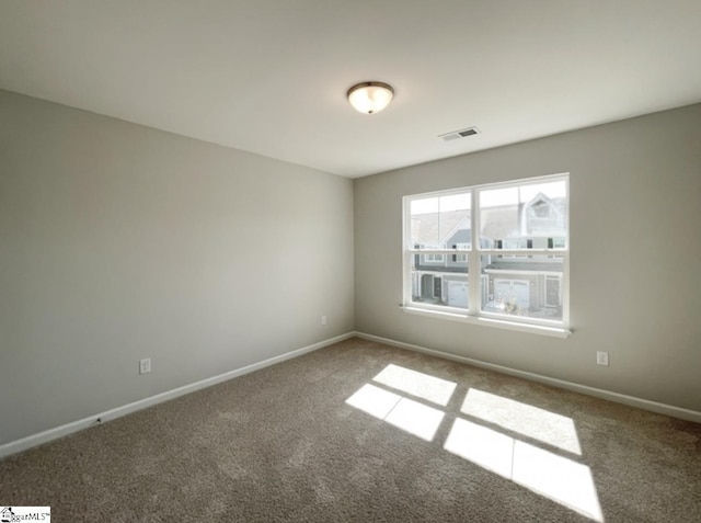 508 Pennystone Ln, Simpsonville, SC 29681 - spare room with baseboards, visible vents, and carpet