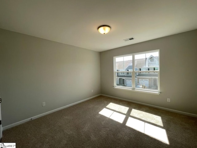 508 Pennystone Ln, Simpsonville, SC 29681 - unfurnished room with baseboards, visible vents, and carpet