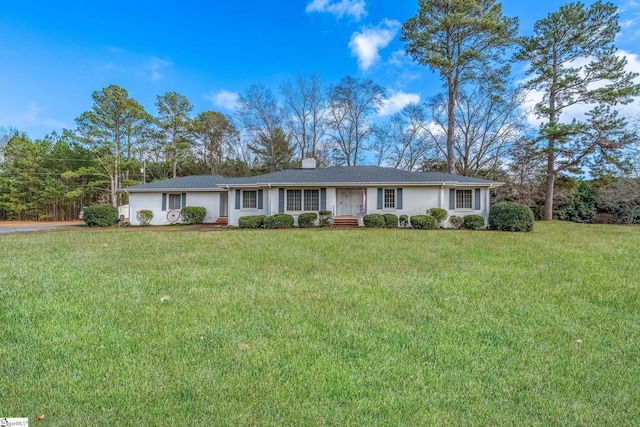 single story home with a front lawn