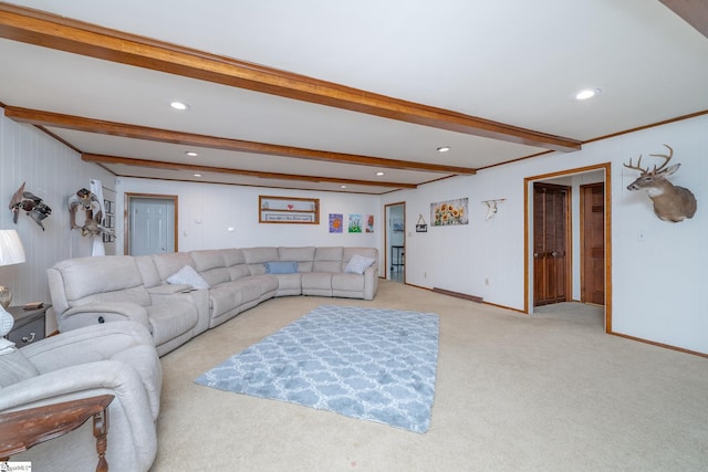 living room featuring beamed ceiling and light carpet