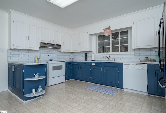 kitchen featuring blue cabinetry, white cabinetry, white appliances, and sink