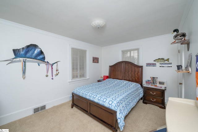 carpeted bedroom featuring crown molding