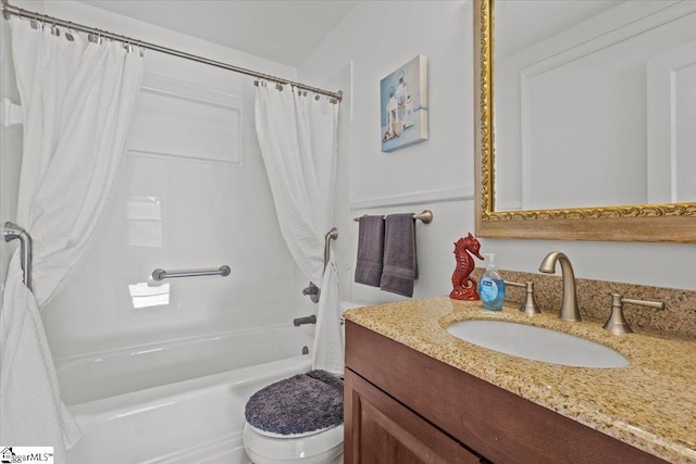 full bathroom with vanity, toilet, and shower / tub combo with curtain