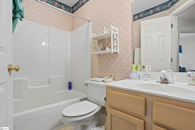 full bathroom with vanity, shower / bathtub combination, and toilet