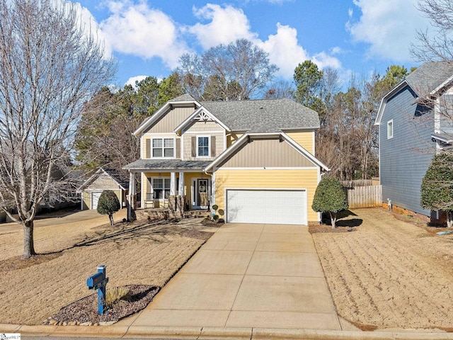 craftsman-style home with a porch and a garage