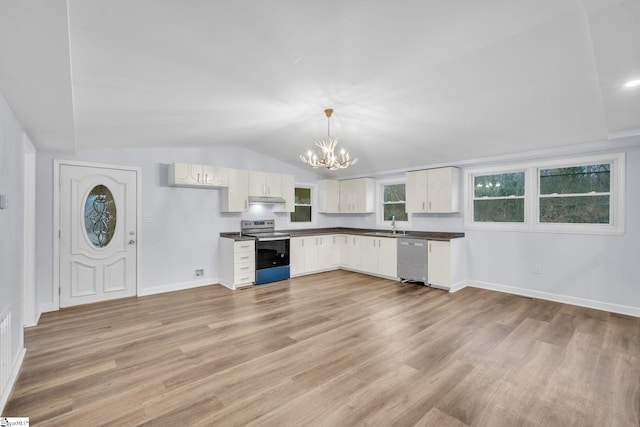 kitchen featuring stainless steel appliances, light hardwood / wood-style flooring, pendant lighting, vaulted ceiling, and white cabinets