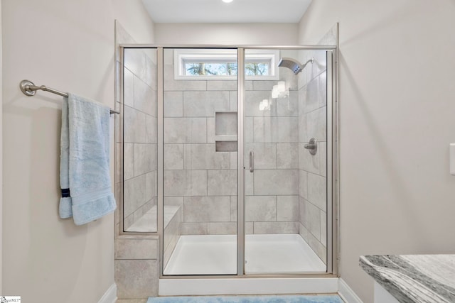 bathroom with an enclosed shower