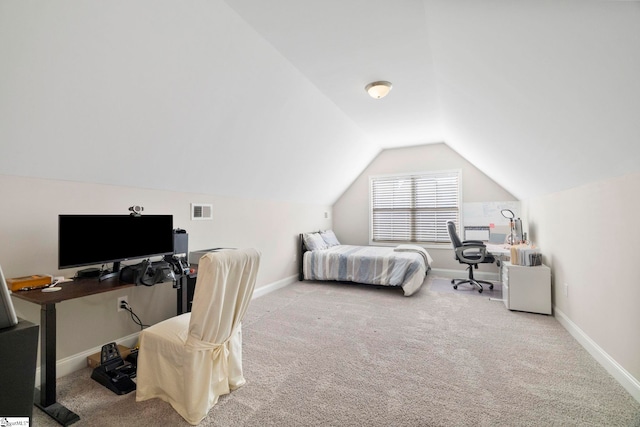 bedroom featuring carpet floors and lofted ceiling