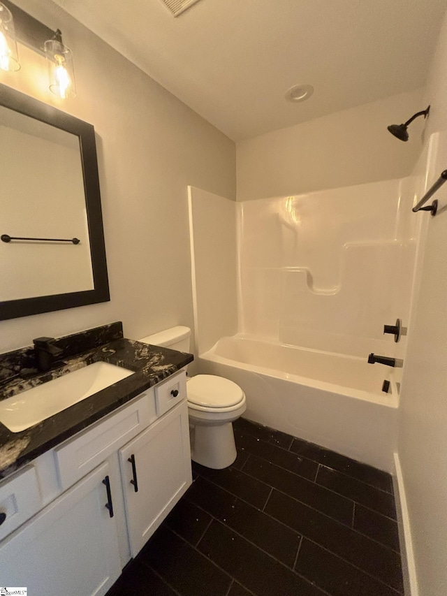 full bathroom featuring vanity, toilet, and tub / shower combination