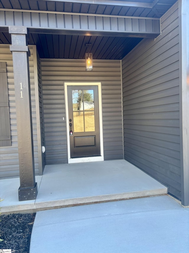 property entrance with a porch