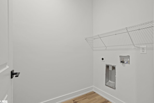 laundry room featuring hookup for an electric dryer, washer hookup, and hardwood / wood-style floors