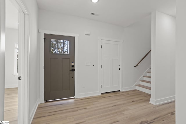 entrance foyer featuring light hardwood / wood-style flooring