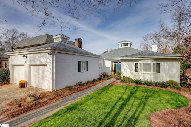 view of front of home with a front yard