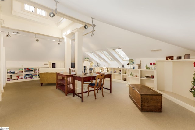 interior space with carpet flooring and vaulted ceiling