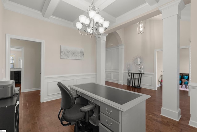 office featuring ornamental molding, ornate columns, a notable chandelier, beam ceiling, and dark hardwood / wood-style flooring