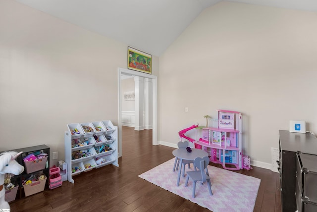 rec room featuring vaulted ceiling and dark hardwood / wood-style floors