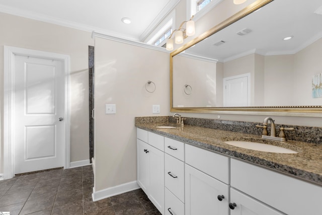 bathroom with vanity and ornamental molding