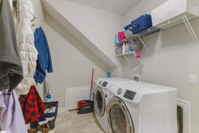 laundry room with washer and dryer