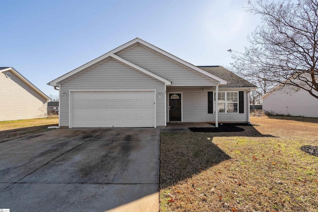 view of front facade with a garage and a front lawn