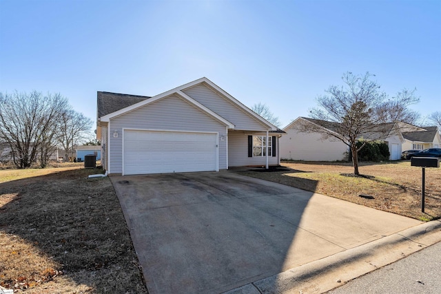 ranch-style house with a front yard and a garage