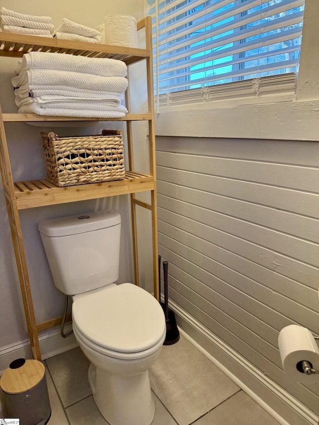 bathroom featuring tile patterned floors and toilet