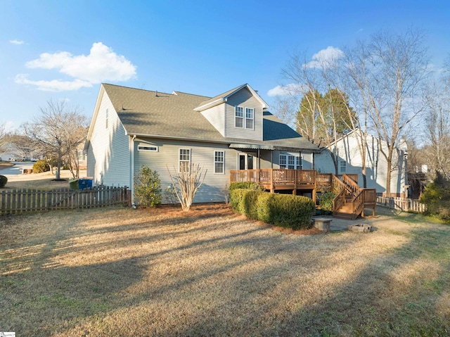 back of property with a deck