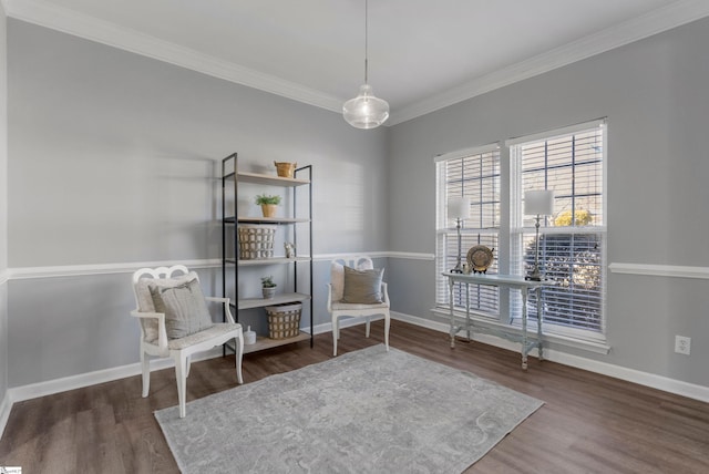 sitting room featuring hardwood / wood-style floors and ornamental molding