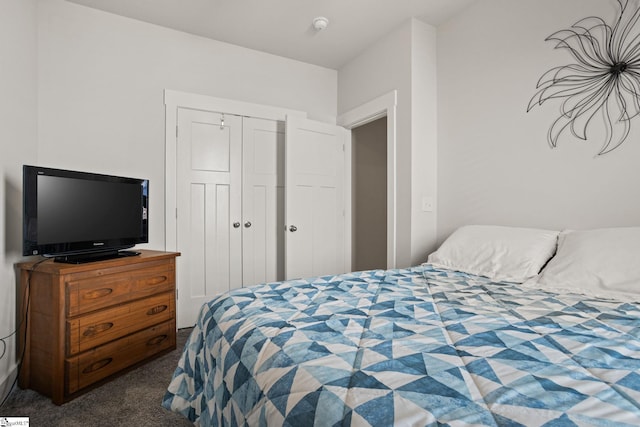 carpeted bedroom featuring a closet