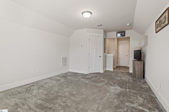 bonus room with carpet and lofted ceiling