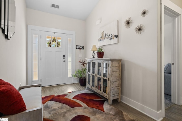 entrance foyer featuring hardwood / wood-style floors