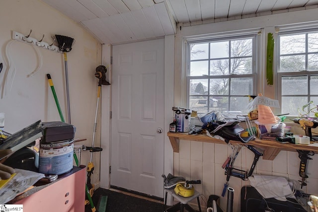 misc room with wood ceiling and vaulted ceiling